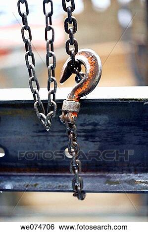 Construction chain and hook lifting steel I beam View Large Photo Image Stock Photograph - Construction chain and hook lifting steel I beam. Fotosearch
