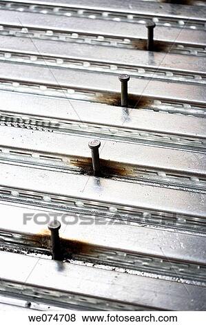 Construction galvanized steel decking with pegs View Large Photo Image Stock Photo - Construction galvanized steel decking with pegs. Fotosearch
