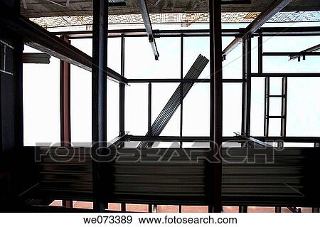 Stock Photo - Construction site look up of steel beams. Fotosearch