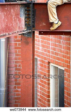 Construction steel worker leg showing on steel I beam View Large Photo Image Picture - Construction steel worker leg showing on steel I beam. Fotosearch