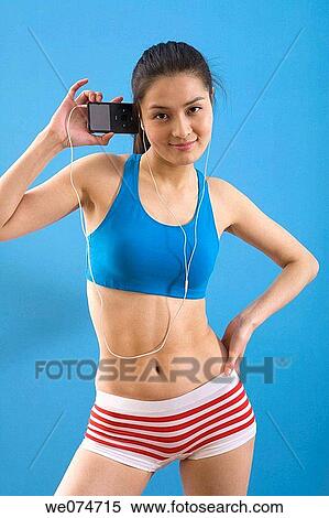 contemporary, ethnic, earphone, Asian View Large Photo Image Stock Photography - contemporary, ethnic, earphone, Asian. Fotosearch