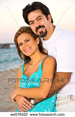 Couple at the beach, Deerfield Beach, Florida, USA View Large Photo Image Stock Image - Couple at the beach, Deerfield Beach, Florida, USA. Fotosearch