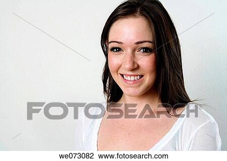 Cute early 20's caucasian female poses for head and shoulders studio portrait View Large Photo Image Stock Image - Cute early 20's caucasian female poses for head and shoulders studio portrait. Fotosearch