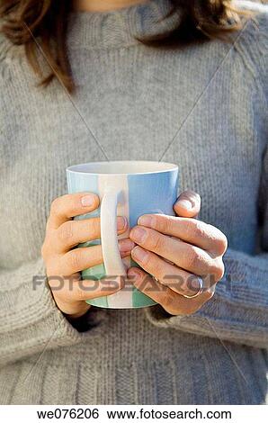 drinking a hot cup of coffee View Large Photo Image Stock Photograph - drinking a hot cup of coffee. Fotosearch