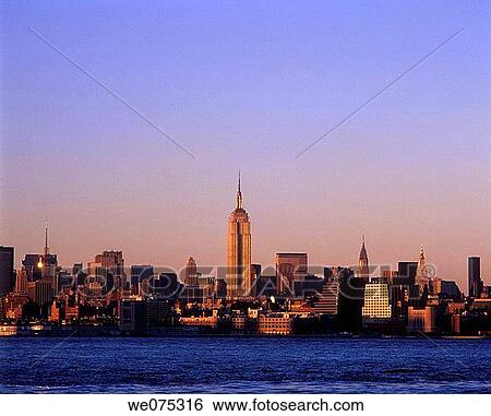 EMPIRE STATE BUILDING. MIDTOWN SKYLINE. MANHATTAN NEW YORK. USA View Large Photo Image Stock Photograph - EMPIRE STATE BUILDING. MIDTOWN SKYLINE. MANHATTAN NEW YORK. USA. Fotosearch