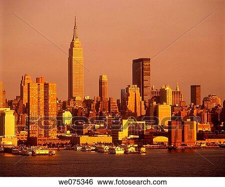 EMPIRE STATE BUILDING. MIDTOWN SKYLINE. MANHATTAN NEW YORK. USA View Large Photo Image Stock Photograph - EMPIRE STATE BUILDING. MIDTOWN SKYLINE. MANHATTAN NEW YORK. USA. Fotosearch