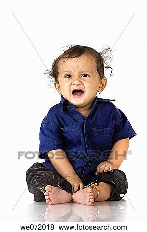 Stock Photo - Expressions of a crying child.. Fotosearch