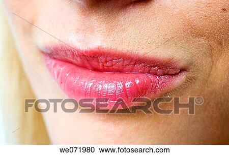 Facial close-up, lips of young blond woman in studio portrait, Los Angeles, California, USA View Large Photo Image Stock Image - Facial close-up, lips of young blond woman in studio portrait, Los Angeles, California, USA. Fotosearch