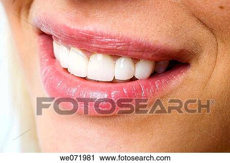 Facial close up, teeth, lips, smile of young blond woman in studio portrait, Los Angeles, California, USA View Large Photo Image Stock Image - Facial close up, teeth, lips, smile of young blond woman in studio portrait, Los Angeles, California, USA. Fotosearch