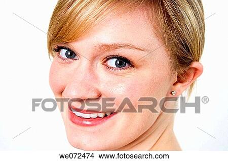 Facial closeup of happy young blond woman with sparkling eyes. View Large Photo Image Picture - Facial closeup of happy young blond woman with sparkling eyes.. Fotosearch
