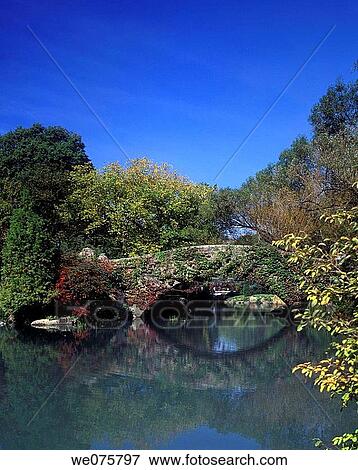 FALL CAPSHAW BRIDGE. POND CENTRAL PARK. MANHATTAN NEW YORK. USA View Large Photo Image Stock Photo - FALL CAPSHAW BRIDGE. POND CENTRAL PARK. MANHATTAN NEW YORK. USA. Fotosearch