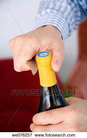 France, Paris, the art of screwing the cork View Large Photo Image Stock Photo - France, Paris, the art of screwing the cork. Fotosearch