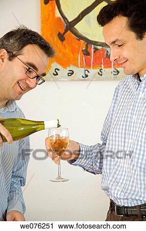 Friends at a winetasting View Large Photo Image Stock Image - Friends at a winetasting. Fotosearch