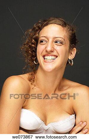 Girl on a corset smiling View Large Photo Image Stock Photo - Girl on a corset smiling. Fotosearch