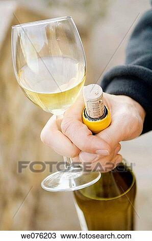 Stock Image - Glass of white wine. Fotosearch