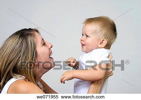 Happy mother holding son. View Large Photo Image Stock Photography - Happy mother holding son.. Fotosearch