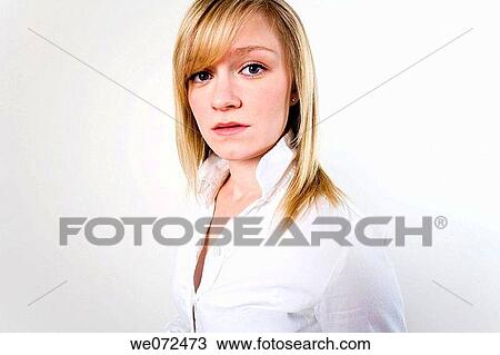 Head and body shot of young blond woman in white shirt in studio portrait. View Large Photo Image Stock Image - Head and body shot of young blond woman in white shirt in studio portrait.. Fotosearch