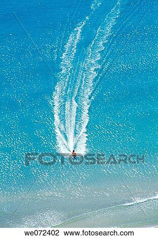 Jet skiing. Alicante, Comunidad Valenciana, Spain View Large Photo Image Stock Image - Jet skiing. Alicante, Comunidad Valenciana, Spain. Fotosearch