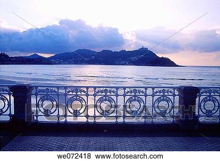 La Concha beach and Mount Igeldo in the evening, Donostia. Guipuzcoa, Euskadi, Spain View Large Photo Image Stock Photo - La Concha beach and Mount Igeldo in the evening, Donostia. Guipuzcoa, Euskadi, Spain. Fotosearch