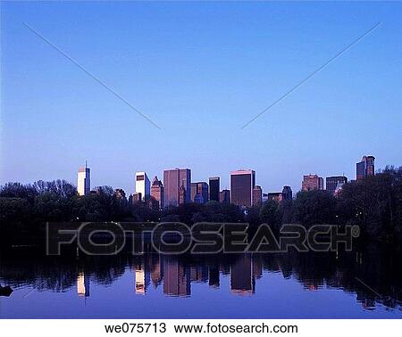 Stock Image - LAKE CENTRAL PARK. MIDTOWN SKYLINE. MANHATTAN NEW YORK. USA. Fotosearch