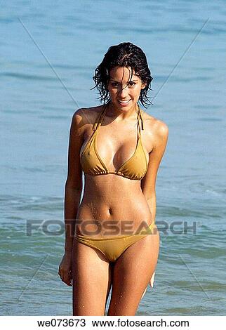 Latin girl posing on the beach View Large Photo Image Stock Image - Latin girl posing on the beach. Fotosearch