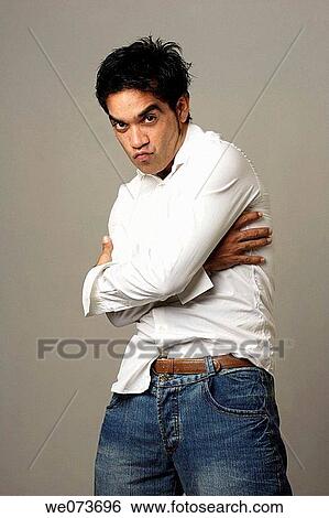 Latin man acting as a supermodel View Large Photo Image Stock Photograph - Latin man acting as a supermodel. Fotosearch