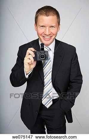 man taking photos View Large Photo Image Stock Photo - man taking photos. Fotosearch