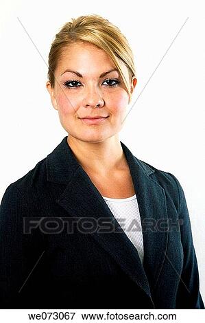 Mid 20's caucasian woman in a head and shoulders studio portrait in business attire. View Large Photo Image Stock Photo - Mid 20's caucasian woman in a head and shoulders studio portrait in business attire.. Fotosearch