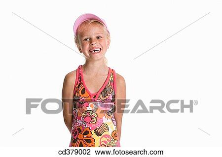 Portrait of a blond girl with a cap View Large Photo Image Stock Image - Portrait of a blond girl with a cap. Fotosearch