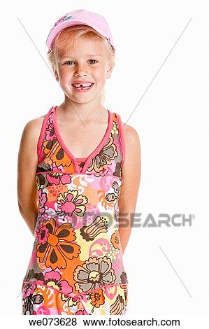 Stock Photo - Portrait of a blond girl with a cap. Fotosearch