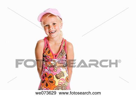 Portrait of a blond girl with a cap View Large Photo Image Stock Photo - Portrait of a blond girl with a cap. Fotosearch