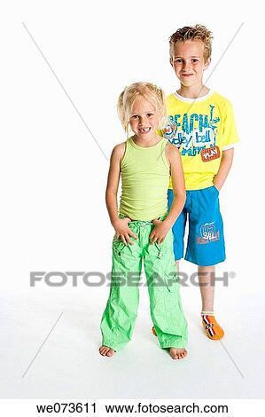 Stock Image - Portrait of brother and sister. Fotosearch