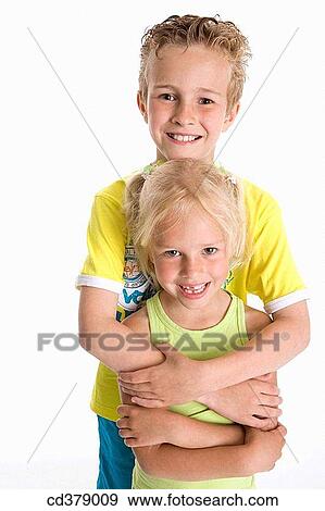 Stock Photo - Portrait of brother and sister. Fotosearch