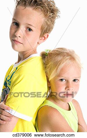 Stock Photograph - Portrait of brother and sister. Fotosearch