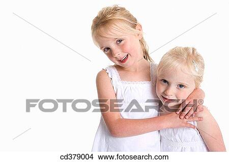 Portrait of two blond girls View Large Photo Image Picture - Portrait of two blond girls. Fotosearch
