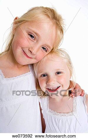 Portrait of two blond girls View Large Photo Image Stock Image - Portrait of two blond girls. Fotosearch
