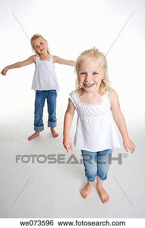 Portrait of two blond girls View Large Photo Image Stock Photograph - Portrait of two blond girls. Fotosearch