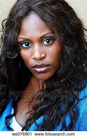Portrait of woman looking at camera View Large Photo Image Stock Image - Portrait of woman looking at camera. Fotosearch