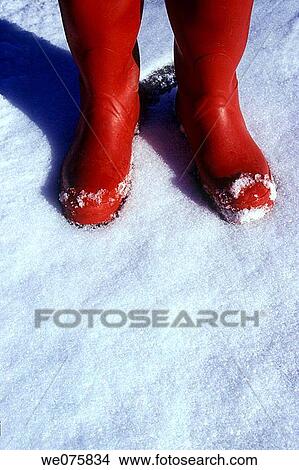 red boots on white snow View Large Photo Image Picture - red boots on white snow. Fotosearch