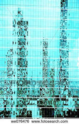 Stock Photograph - Reftions of buildings in a skyscraper in Bagkok (Thailand), next to Chao Praya river. Fotosearch