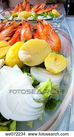 Picture - Salad with potatoes and prawns. Fotosearch