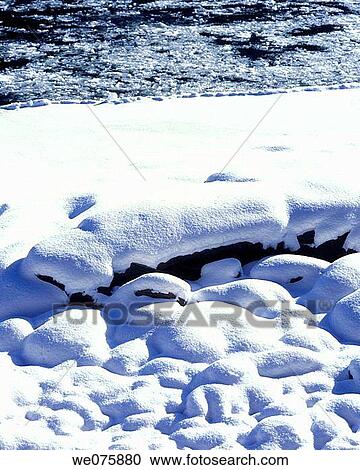 scenic snow patterns on river edge View Large Photo Image Stock Image - scenic snow patterns on river edge. Fotosearch