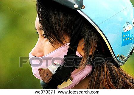 Scooter driver, Chinese girl. Taiwan, China View Large Photo Image Stock Image - Scooter driver, Chinese girl. Taiwan, China. Fotosearch