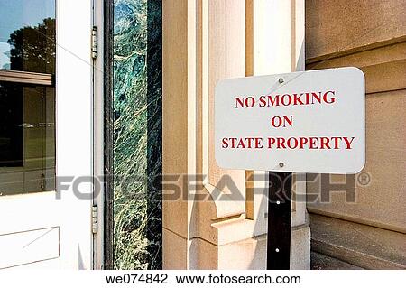 Sign outside a state building reading? No Smoking On State Property? View Large Photo Image Stock Image - Sign outside a state building reading? No Smoking On State Property?. Fotosearch
