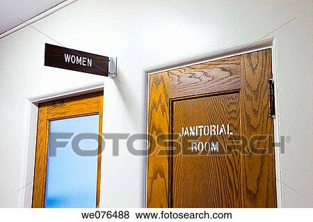 Stock Photo - Signs on two doors in an office building reading? Women? and? Janitorial Room?.. Fotosearch