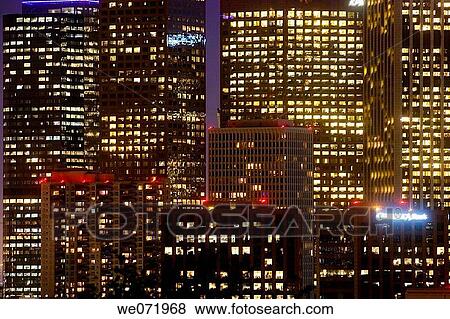 Skyscrapers light up as the sun goes down in Los Angeles, California, USA, North America at dusk, sunset. View Large Photo Image Stock Photo - Skyscrapers light up as the sun goes down in Los Angeles, California, USA, North America at dusk, sunset.. Fotosearch