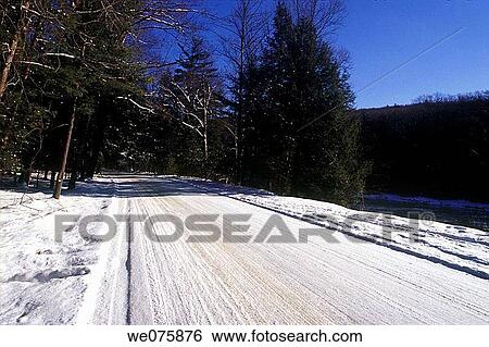 snow covered rural road View Large Photo Image Stock Photograph - snow covered rural road. Fotosearch