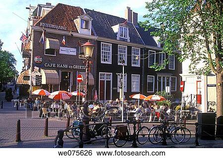 STREET SCENE. CAFE TWEEDE STRAAT. AMSTERDAM HOLLAND View Large Photo Image Stock Photograph - STREET SCENE. CAFE TWEEDE STRAAT. AMSTERDAM HOLLAND. Fotosearch