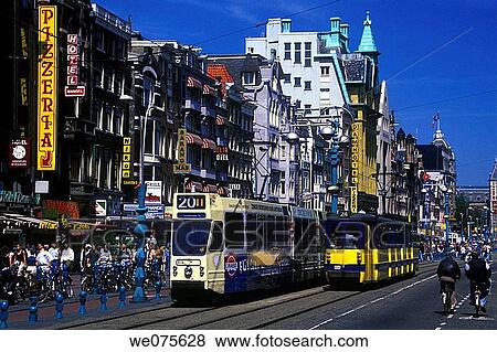 STREET SCENE. DAM RAK AMSTERDAM. HOLLAND View Large Photo Image Stock Photo - STREET SCENE. DAM RAK AMSTERDAM. HOLLAND. Fotosearch