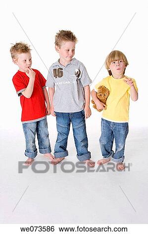 Stock Photograph - Three boys. Fotosearch